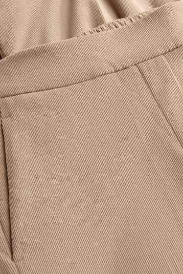 Donna - Pantaloni in velluto a coste - vita media - gamba ampia - beige