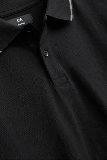 Hommes - Polo à manches longues - slim fit - noir