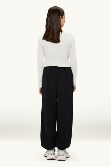 Bambine - Pantaloni sportivi - nero
