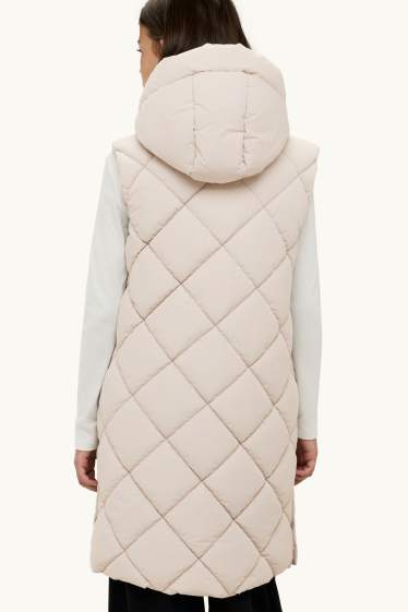 Kinderen: meisjes - Bodywarmer met capuchon - waterafstotend - crème wit