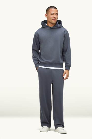 Uomo - Pantaloni sportivi - grigio