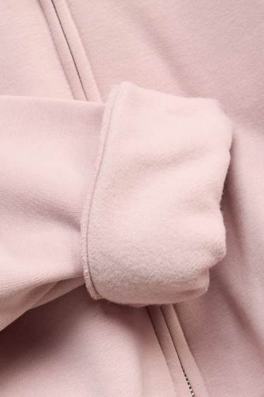 Dona - Dessuadora oberta amb caputxa - rosa pastel