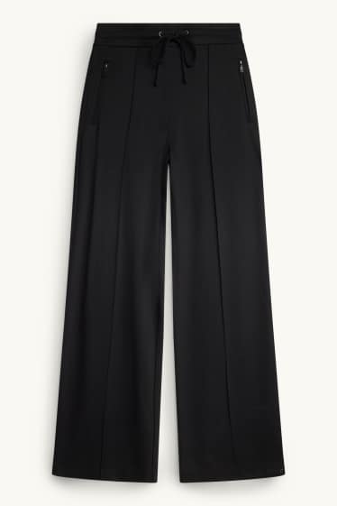 Dona - Pantalons de punt - mid waist - wide leg - negre