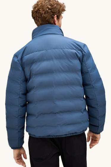 Home - Jaqueta embuatada tècnica - amb folre - impermeable - blau