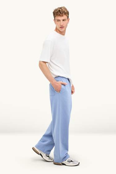 Hommes - Pantalon de jogging - bleu clair