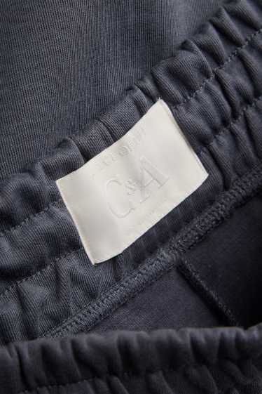 Uomo - Pantaloni sportivi - grigio