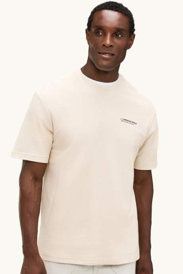 Heren - T-shirt - relaxed fit - crèmekleurig
