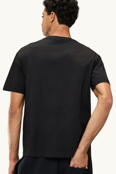 Uomo - T-shirt - relaxed fit - nero