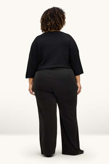 Femei - Pantaloni din jerseu - talie medie - wide leg - aspect lucios - negru