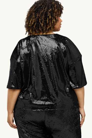 Dames - Blouse met pailletten en V-hals - zwart / zilver