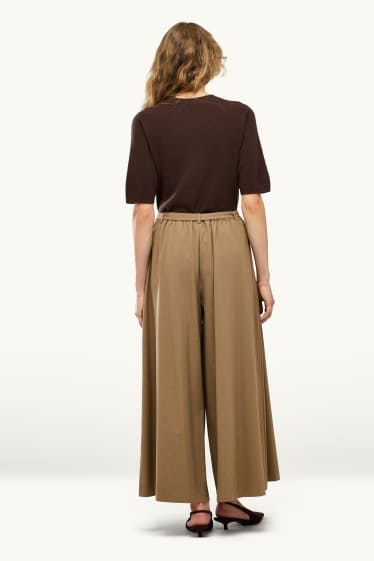 Dona - Pantalons de tela amb cinturó - high waist - wide leg - beix