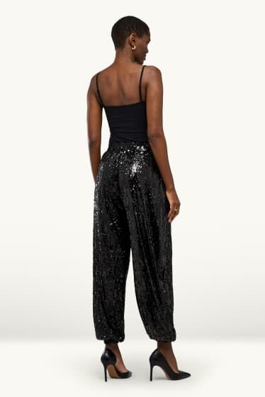 Dames - Paillettenbroek - high waist - balloon leg - zwart / zilver