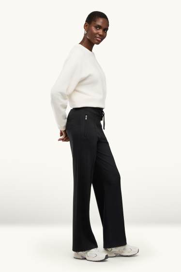 Dona - Pantalons de punt - mid waist - wide leg - negre