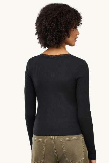 Femmes - Haut à manches longues avec encolure en V - slim fit - finition côtelée - noir