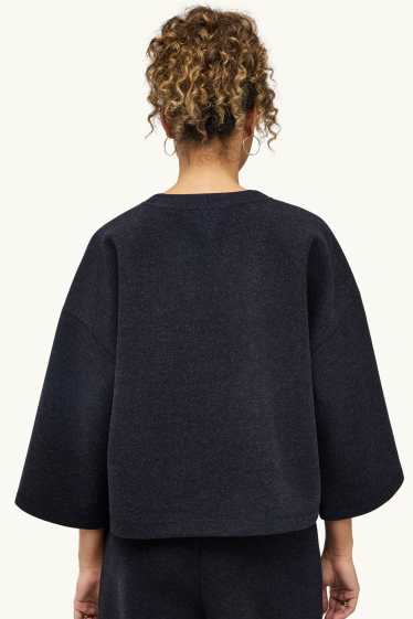 Dona - Dessuadora oversized - blau fosc jaspiat