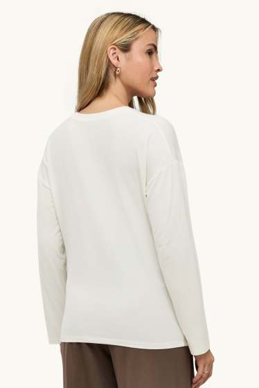 Dames - Longsleeve - regular fit - crème wit