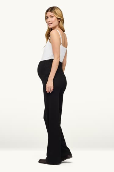 Donna - Pantaloni premaman in jersey - a coste - nero