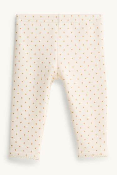 Baby: meisjes - Babylegging - gevoerd met pluche - gestippeld - crèmekleurig