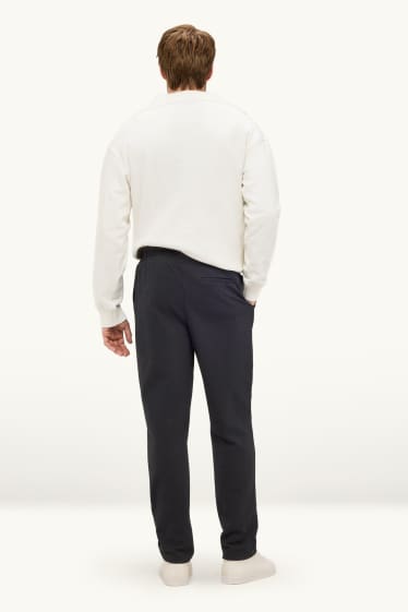 Hommes - Pantalon de jogging - regular fit - finition texturée - noir