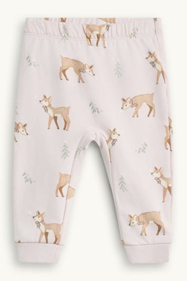 Bebés niñas - Reno y casita - pijama navideño para bebé - forro de peluche - rosa pálido
