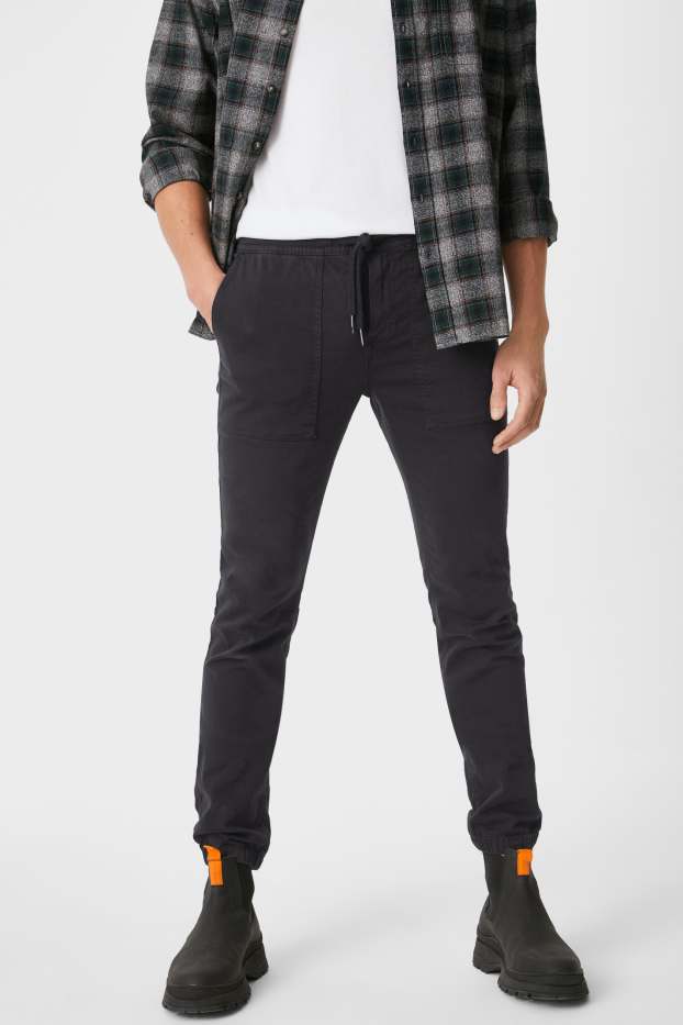 Hommes - Pantalon - jambes fuselées - noir