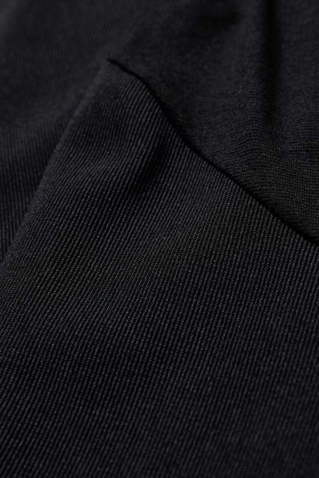 Femmes - Pantalon de grossesse en jersey - flared - noir