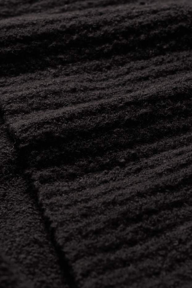 Femmes - Pull en maille bouclée à col roulé - noir
