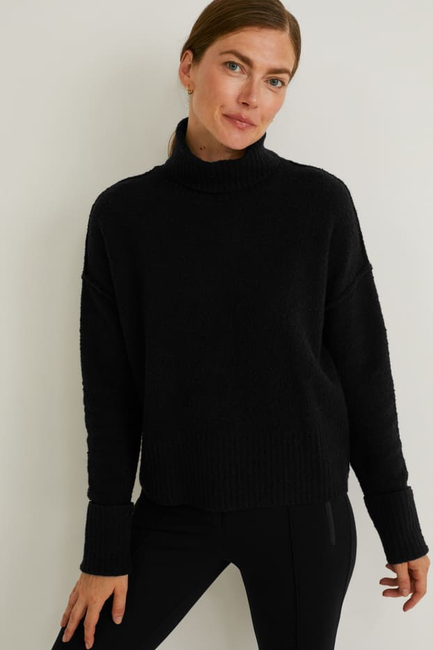 Femmes - Pull en maille bouclée à col roulé - noir