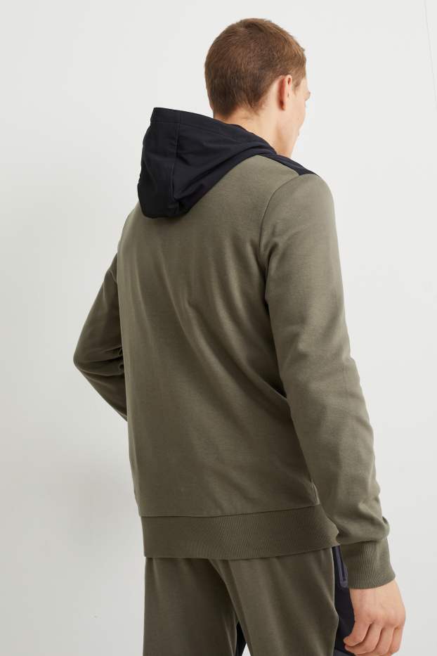 Hommes - Veste en molleton dotée d’une capuche - noir / beige