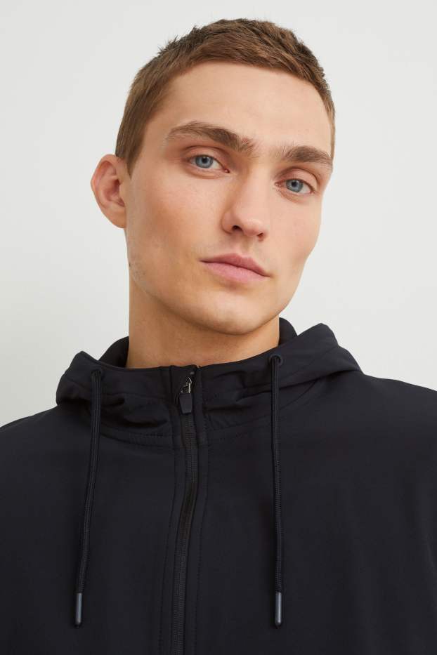 Hommes - Veste en molleton dotée d’une capuche - noir / beige
