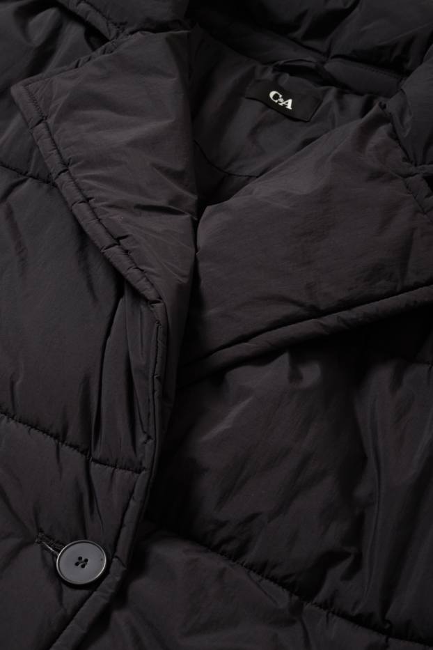 Dona - Abric embuatat - negre