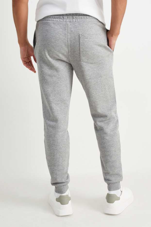 Home - Pantalons de xandall - gris clar jaspiat