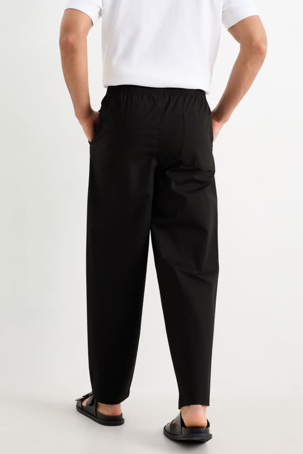 Pánské - Kalhoty chino - tapered fit - černá