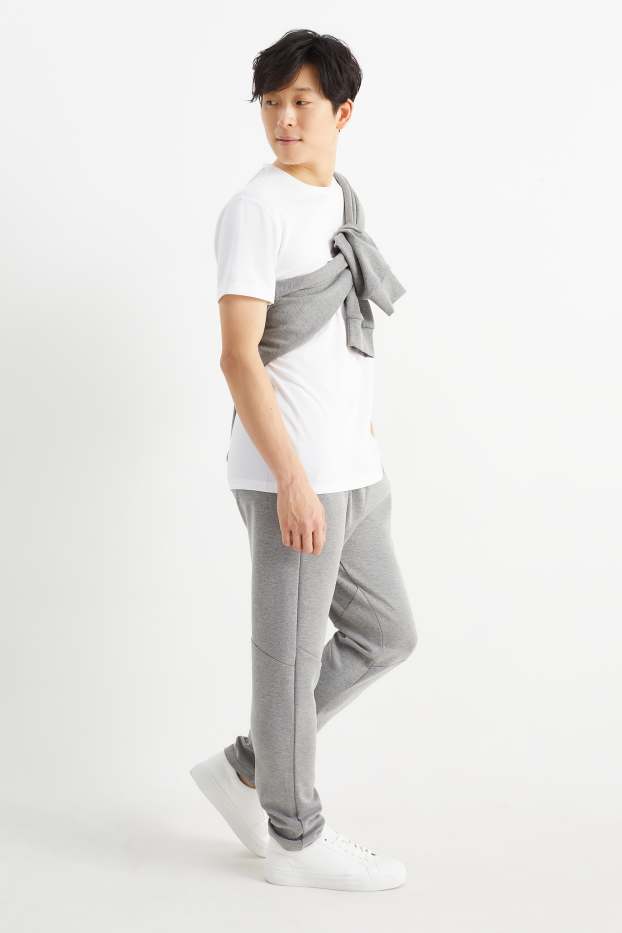 Home - Pantalons de xandall - gris clar jaspiat
