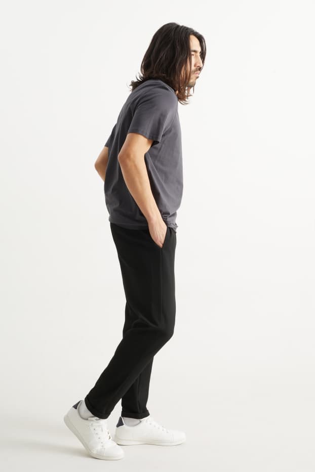 Bărbați - Pantaloni de trening - negru
