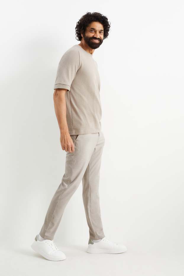Heren - Chino - tapered fit - licht beige
