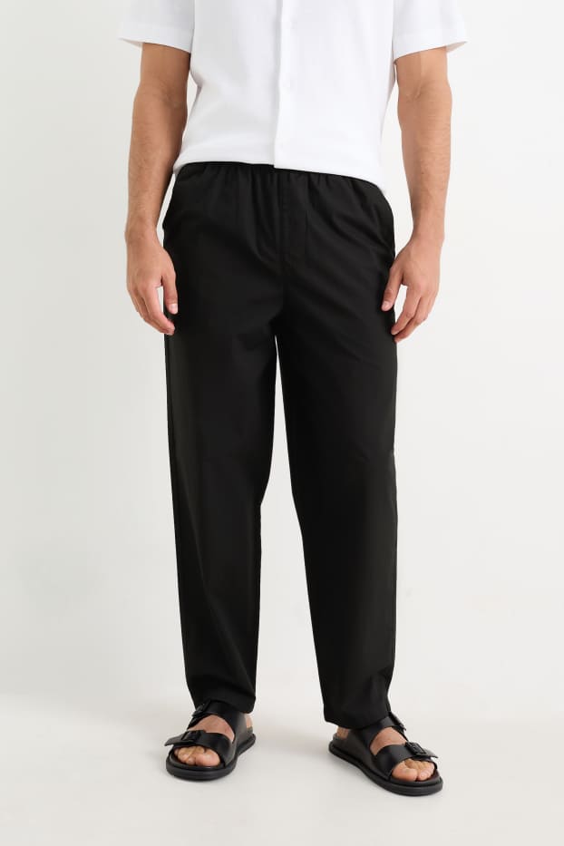 Pánské - Kalhoty chino - tapered fit - černá