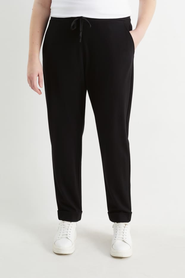 Women - Cloth trousers - mid-rise waist - tapered fit - black