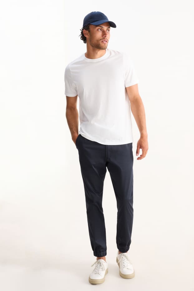 Hommes - Pantalon de jogging - tapered fit - bleu foncé