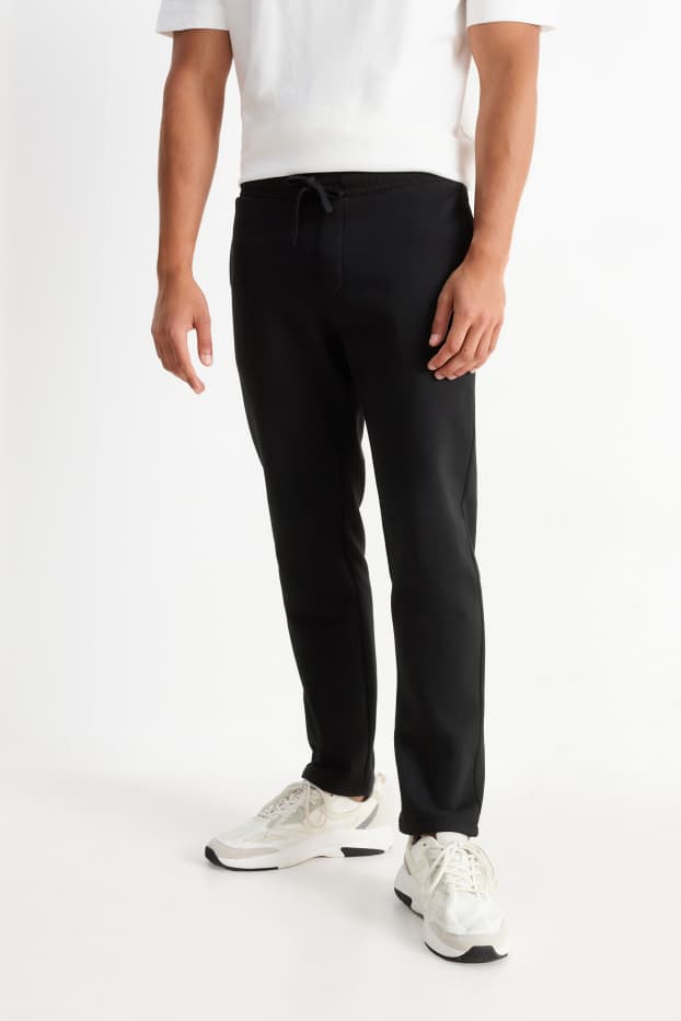 Bărbați - Pantaloni de trening - negru