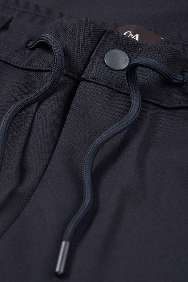 Home - Xinos - tapered fit - blau fosc