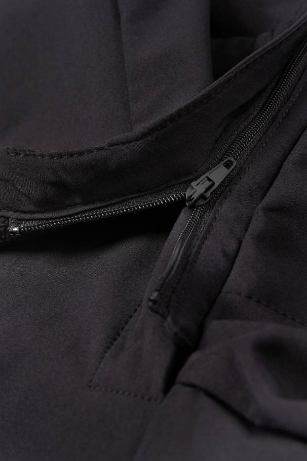 Damen - Softshellmantel mit Kapuze - wasserabweisend - 4 Way Stretch - schwarz