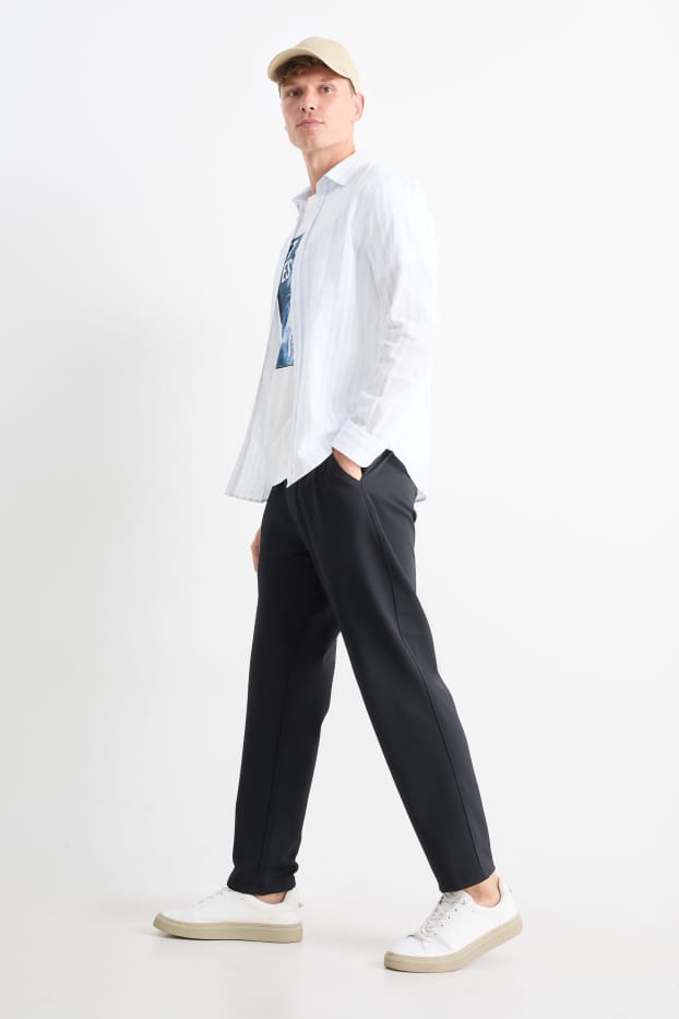 Home - Xinos - tapered fit - blau fosc