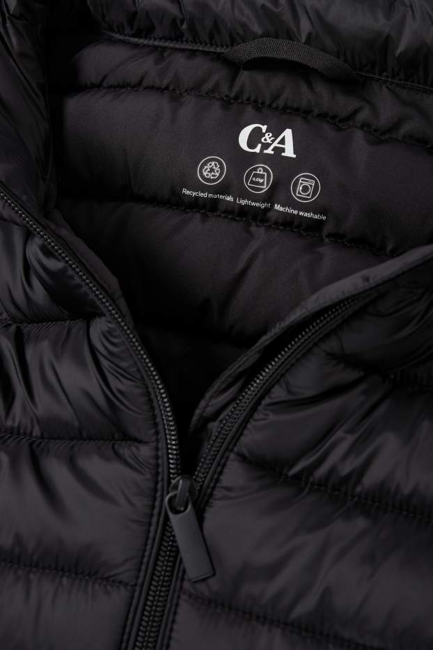 Dames - Lange bodywarmer met capuchon - zwart