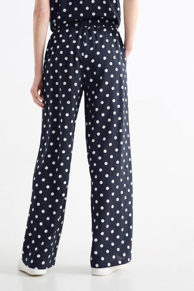 Women - Cloth trousers - high waist - wide leg - polka dot - dark blue