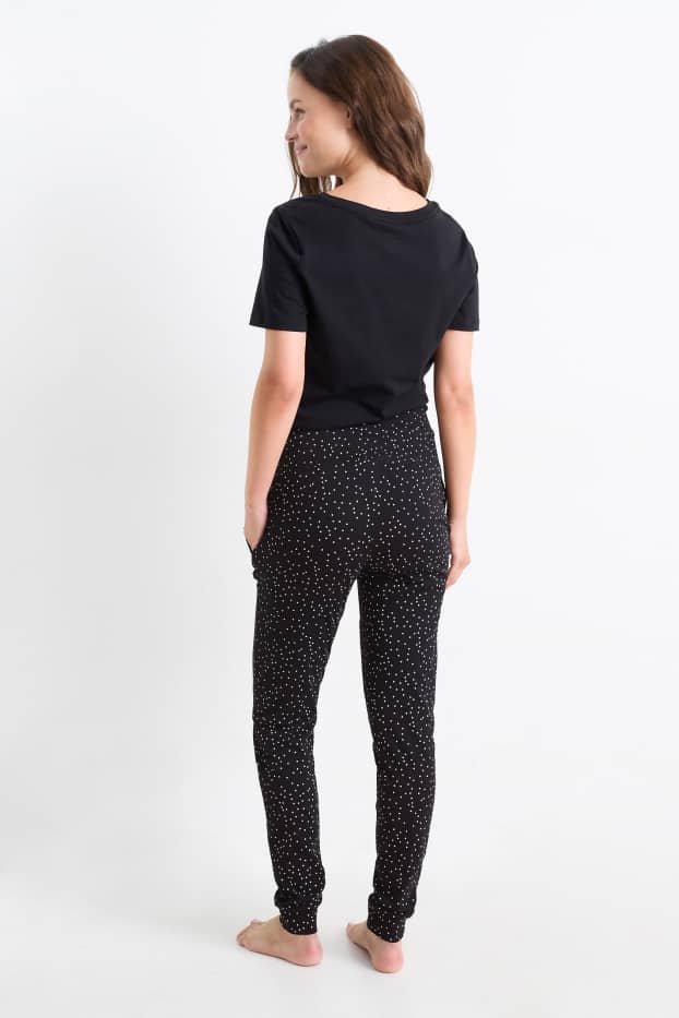 Damen - Umstands-Pyjamahose - gepunktet - schwarz