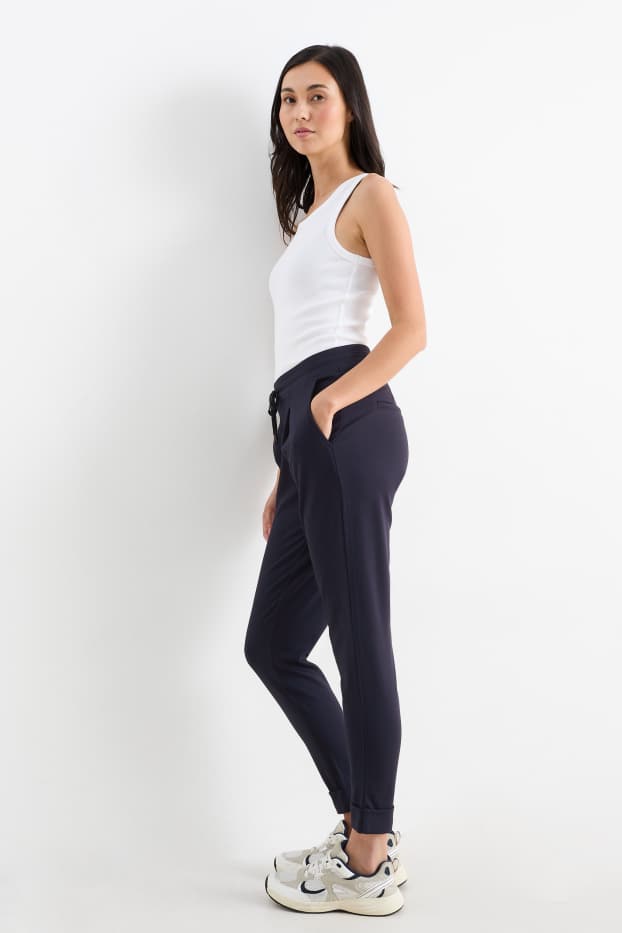 Femmes - Pantalon en jersey - mid waist - tapered fit - bleu foncé