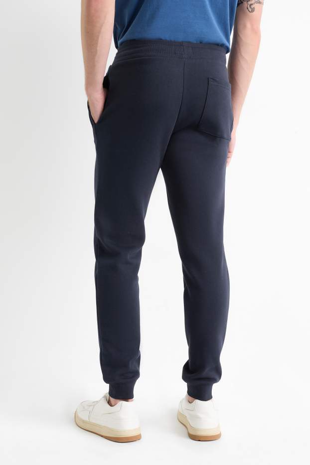 Hommes - Pantalon de jogging - bleu foncé