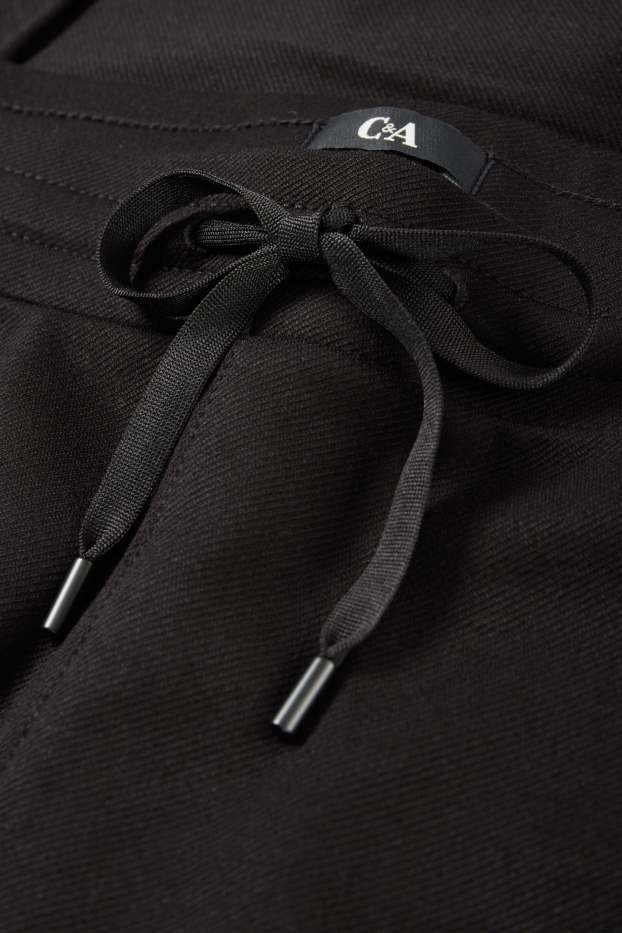 Damen - Stoffhose - Mid Waist - Tapered Fit - schwarz