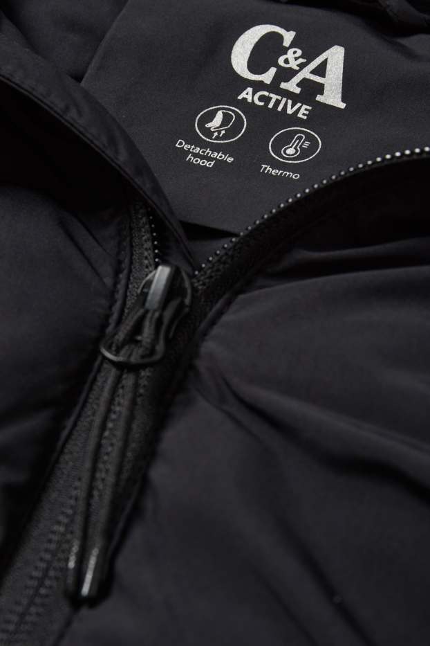 Femmes - Veste chaude de sport à capuche - noir